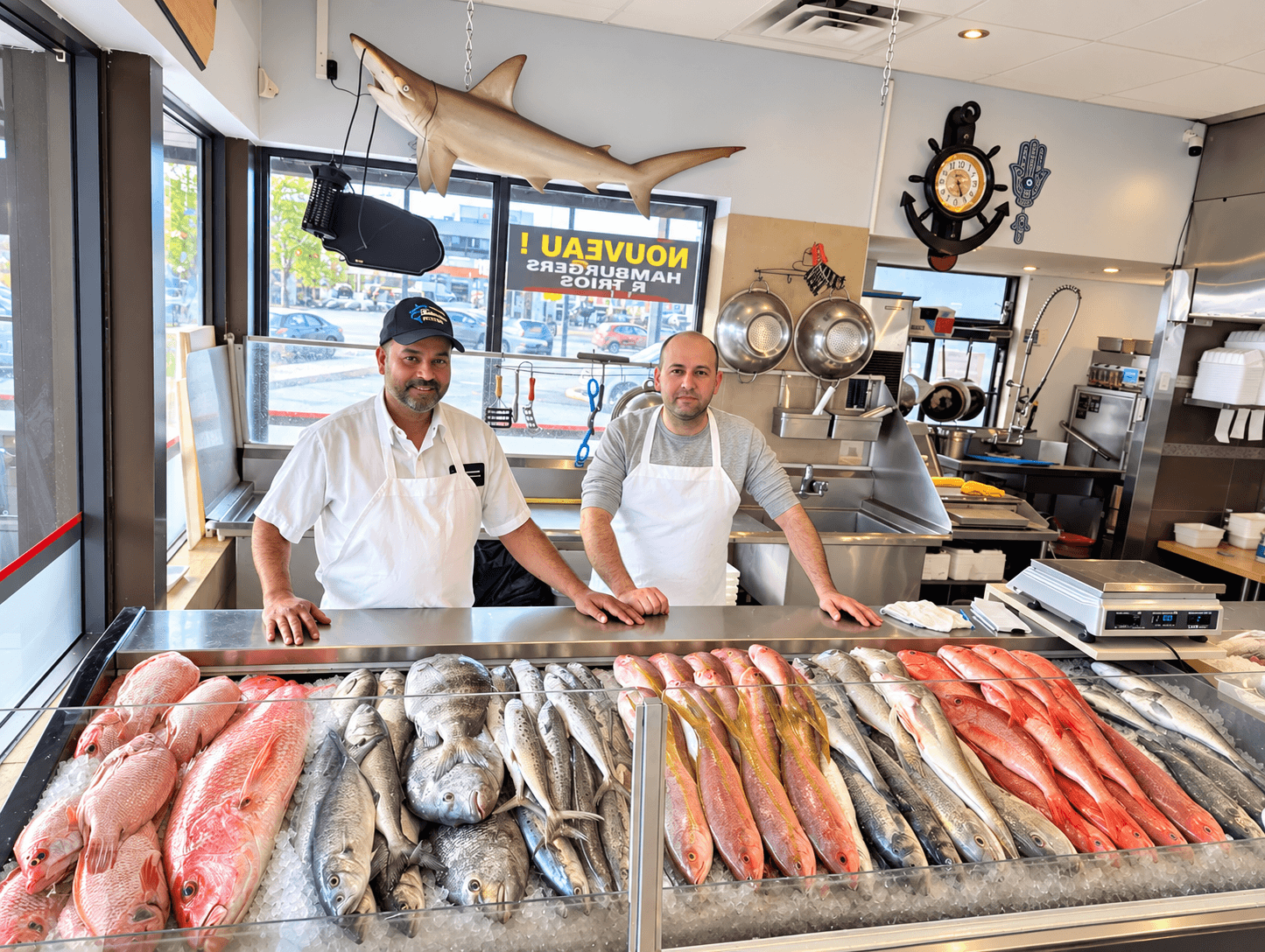 Team behind the fish market counter.